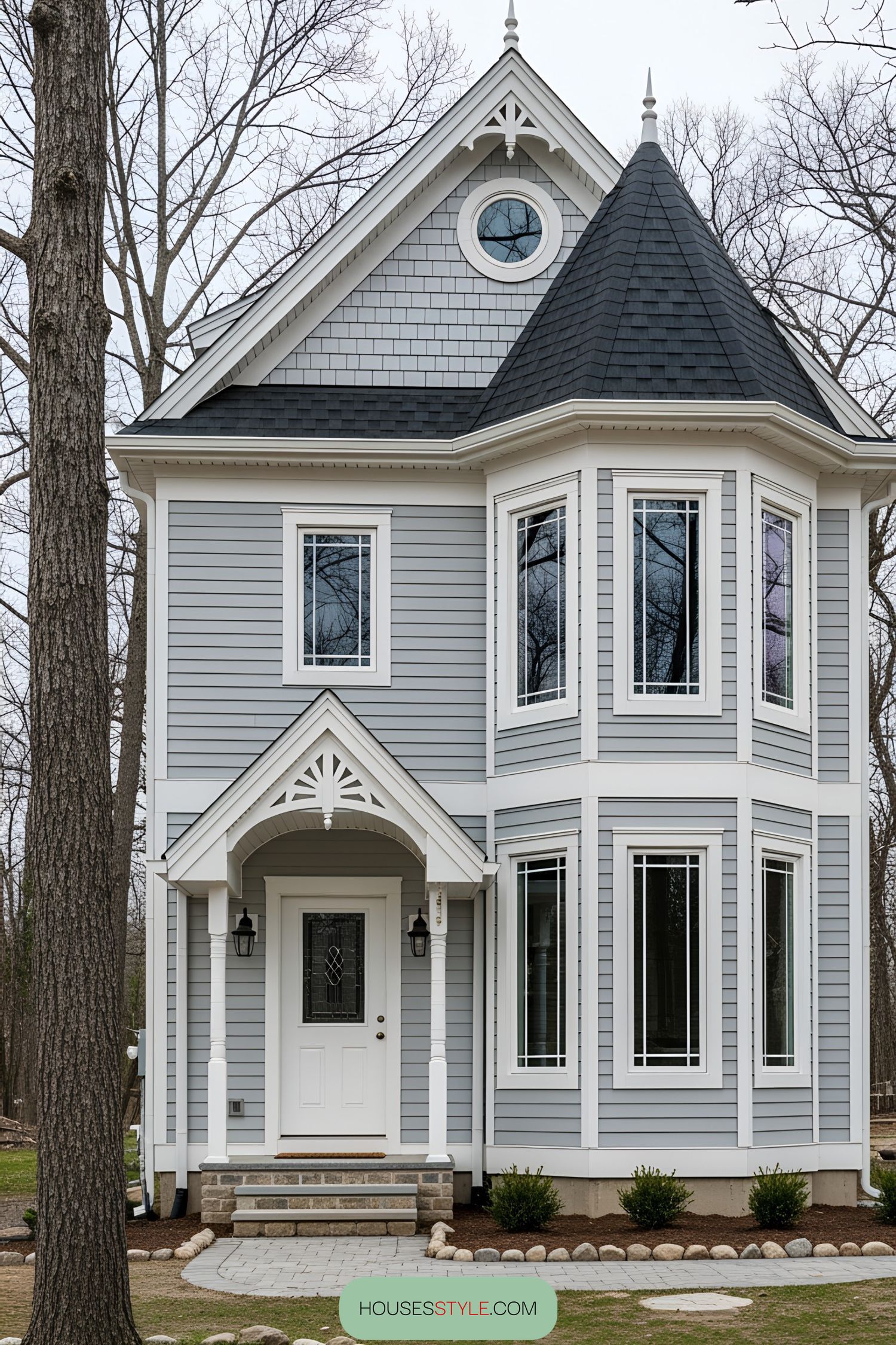 Compact Victorian-style house with a charming turret and gabled roof