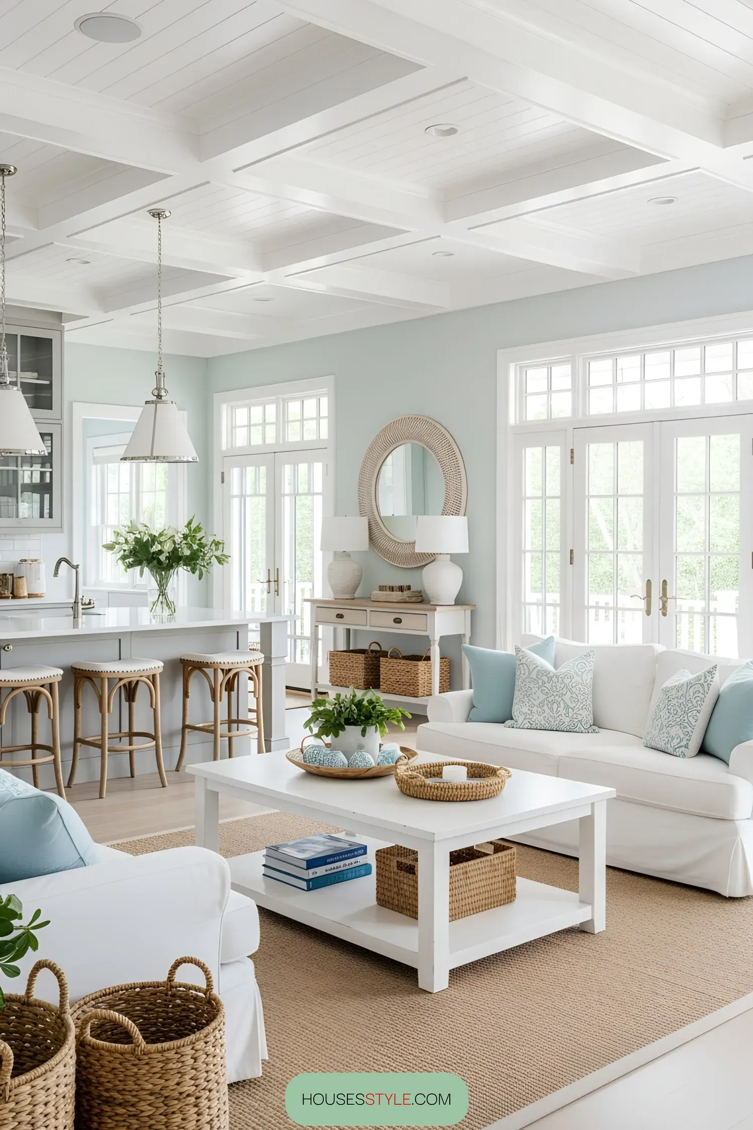 Bright and airy beach house living room with light blue accents and natural textures