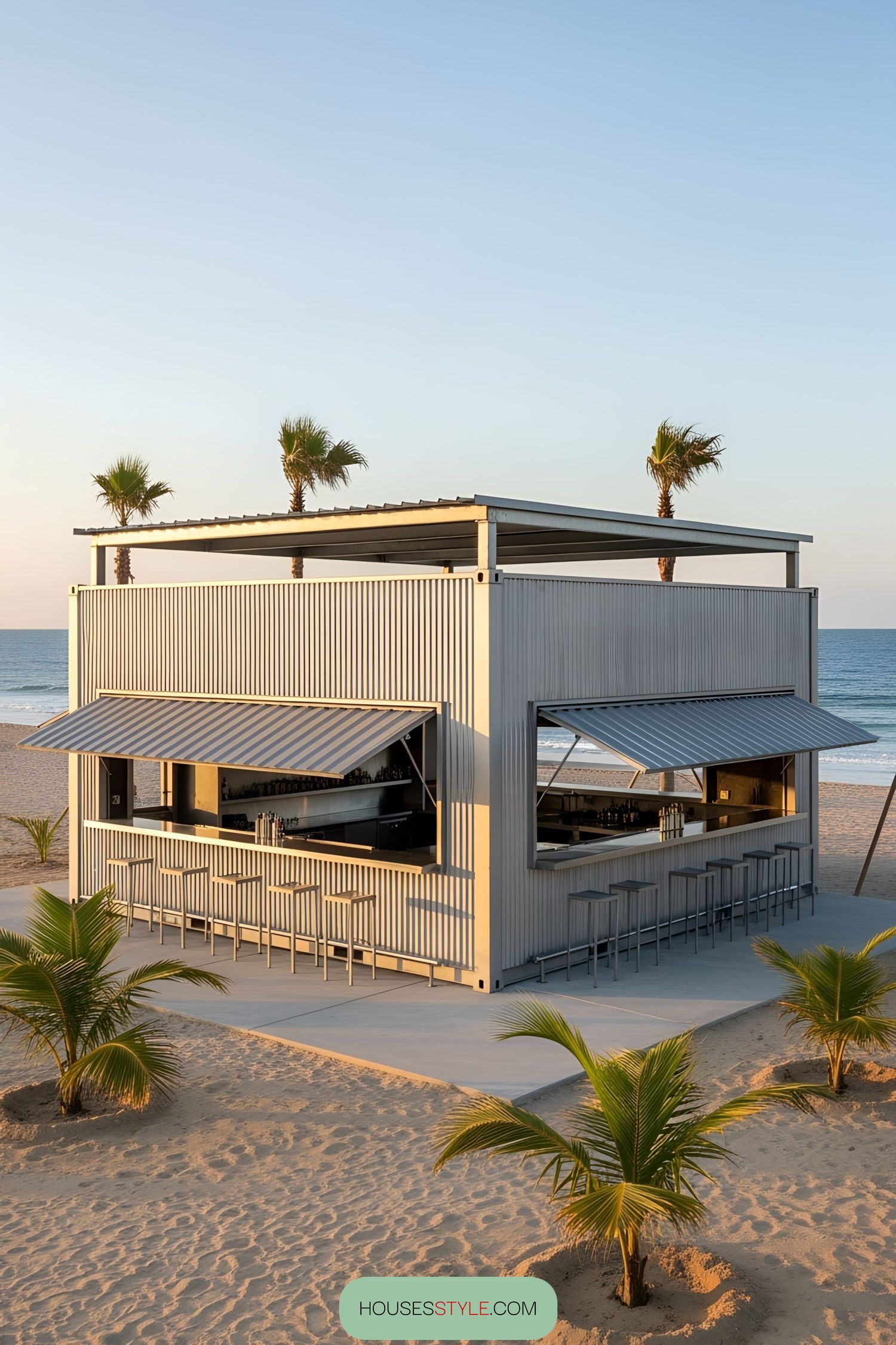 Container bar on a sandy beach with palm trees