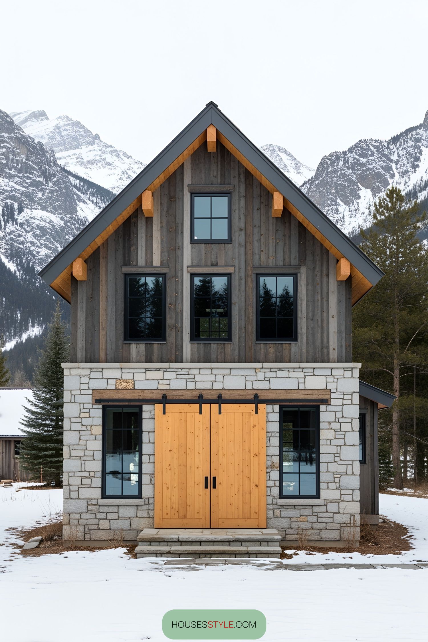 Small rustic house with mountains in the background