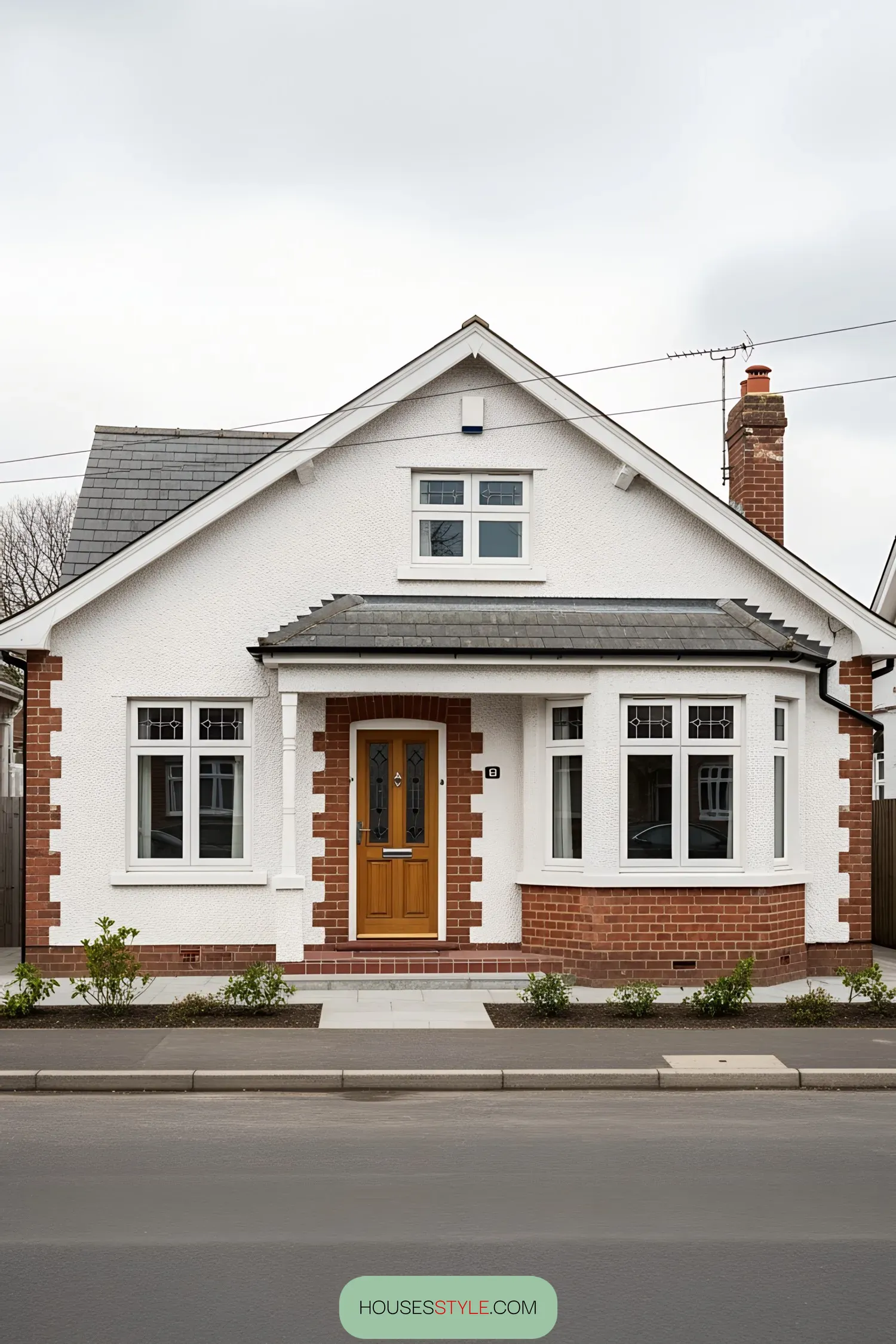 A charming 1930s bungalow with white walls and brick accents