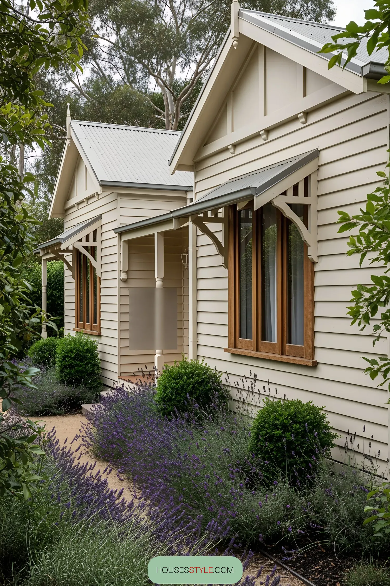 Beige wooden house with lavender garden