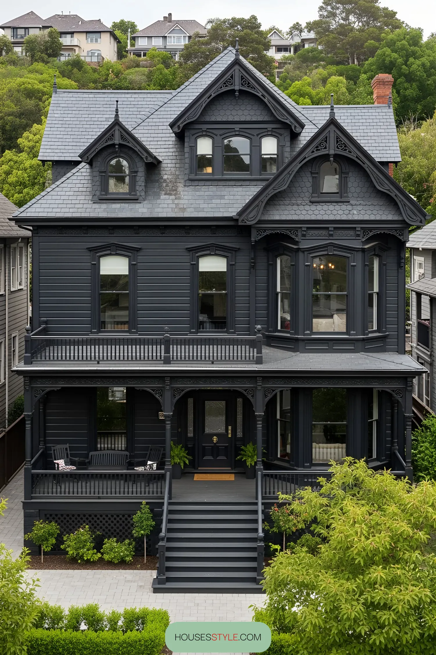 Victorian-style house painted black with ornate details