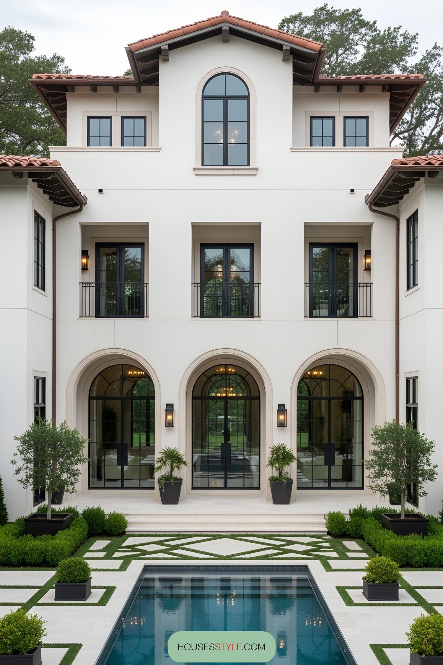 Exquisite villa exterior with pool and gardens