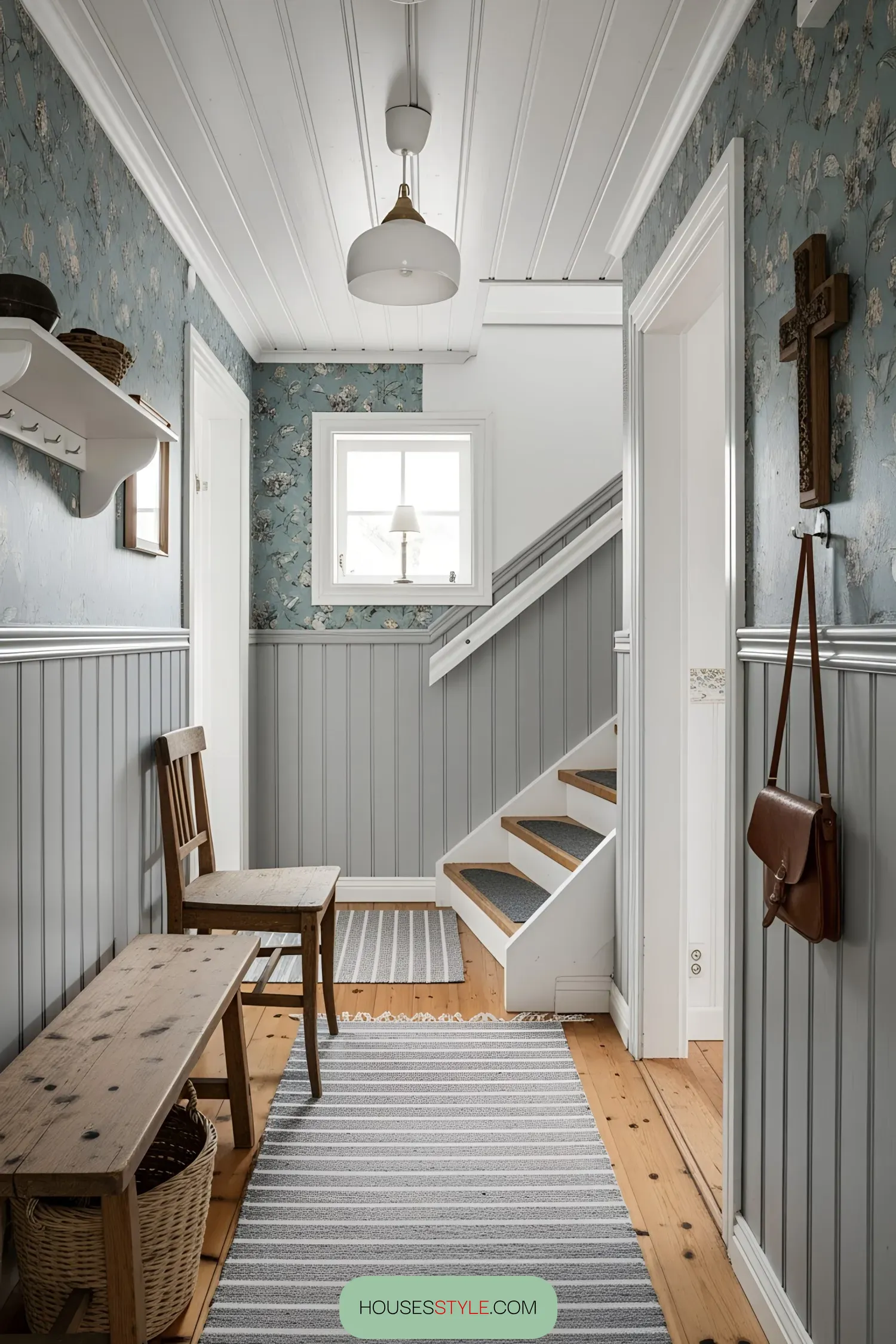 Cozy Swedish hallway with floral wallpaper and wooden accents