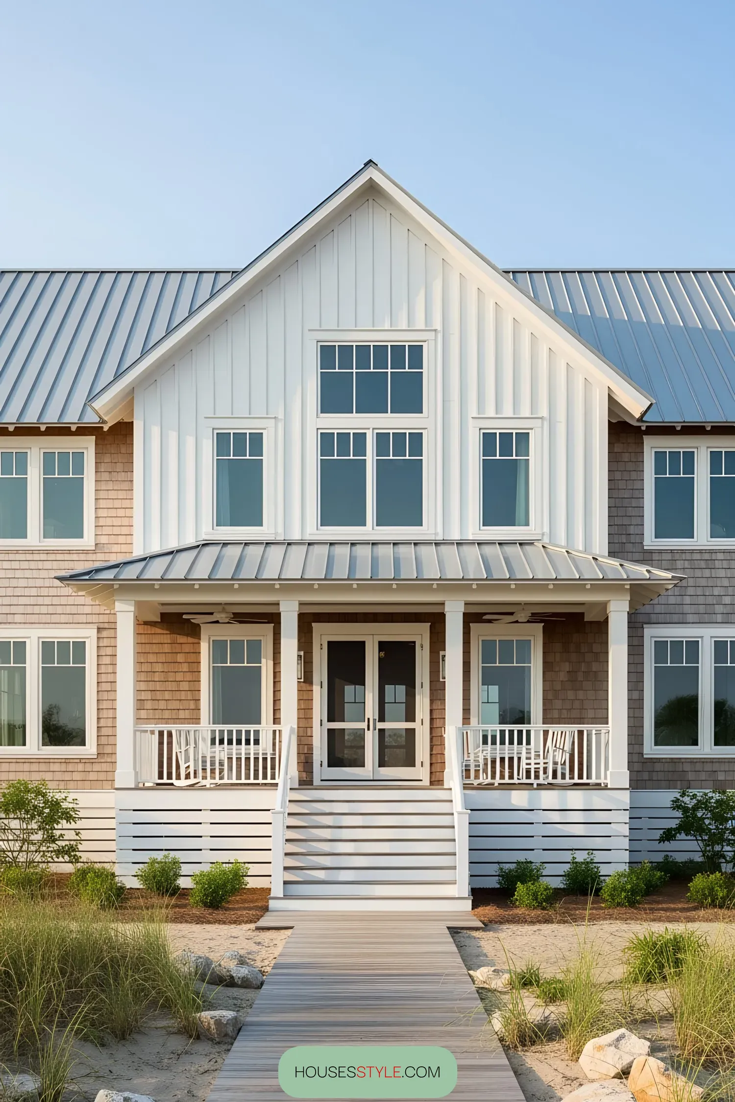 Beachfront house with a welcoming porch and large windows