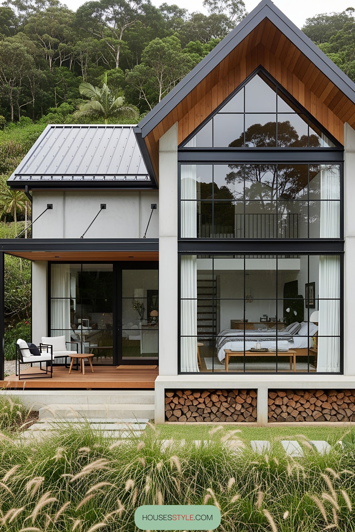 Modern house with large windows and lush surroundings