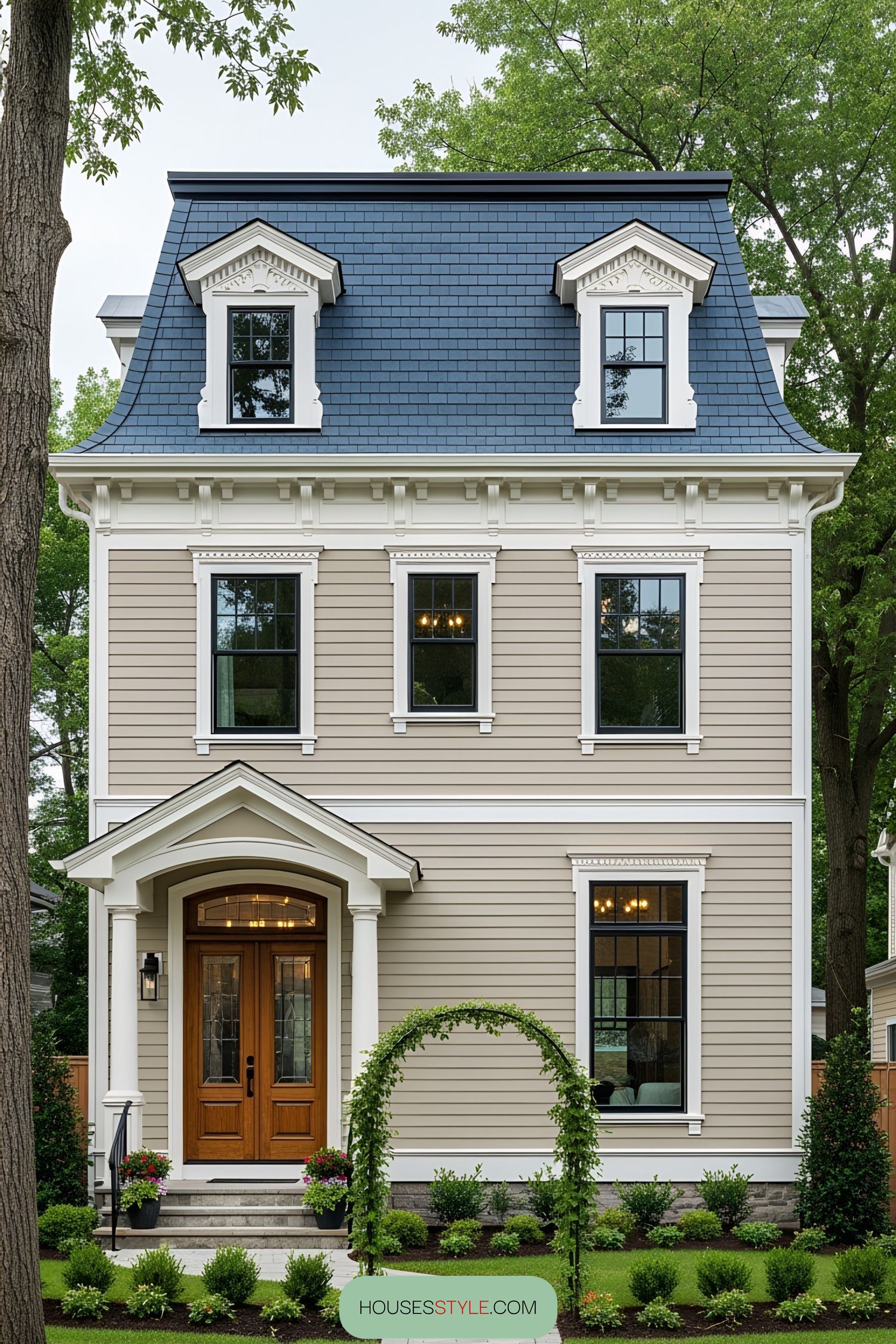 Tiny Victorian-style home with ornate features and shingled roof