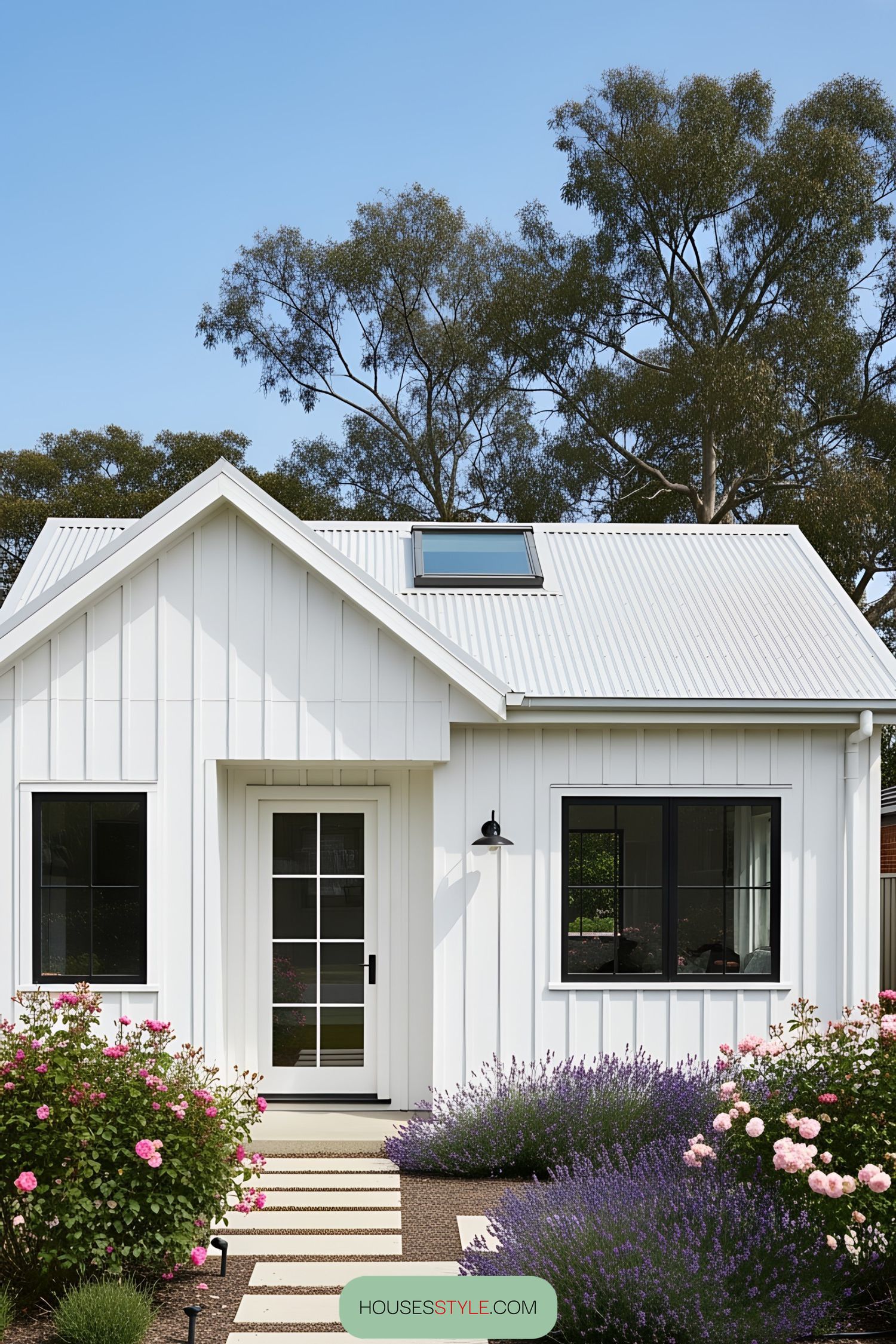 Charming white bungalow with a quaint garden