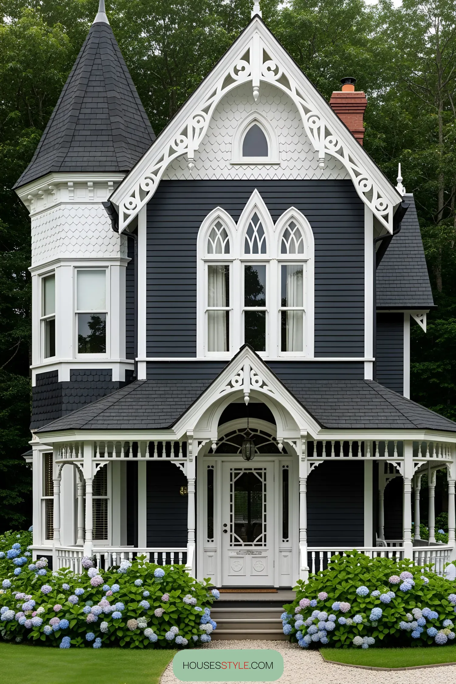 Gothic-style house with turret and blue hydrangeas