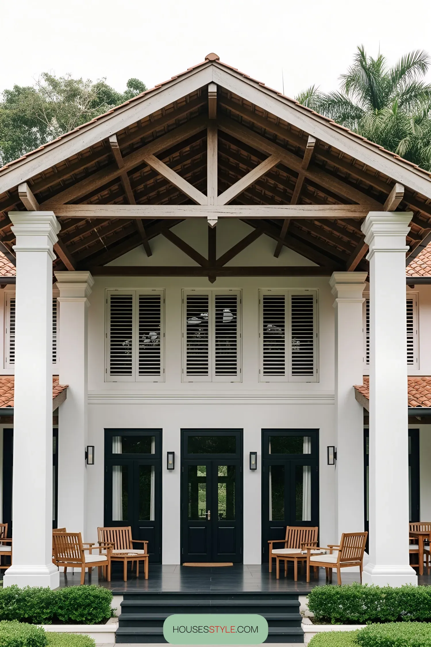 Grand colonial house with white pillars and wooden furniture