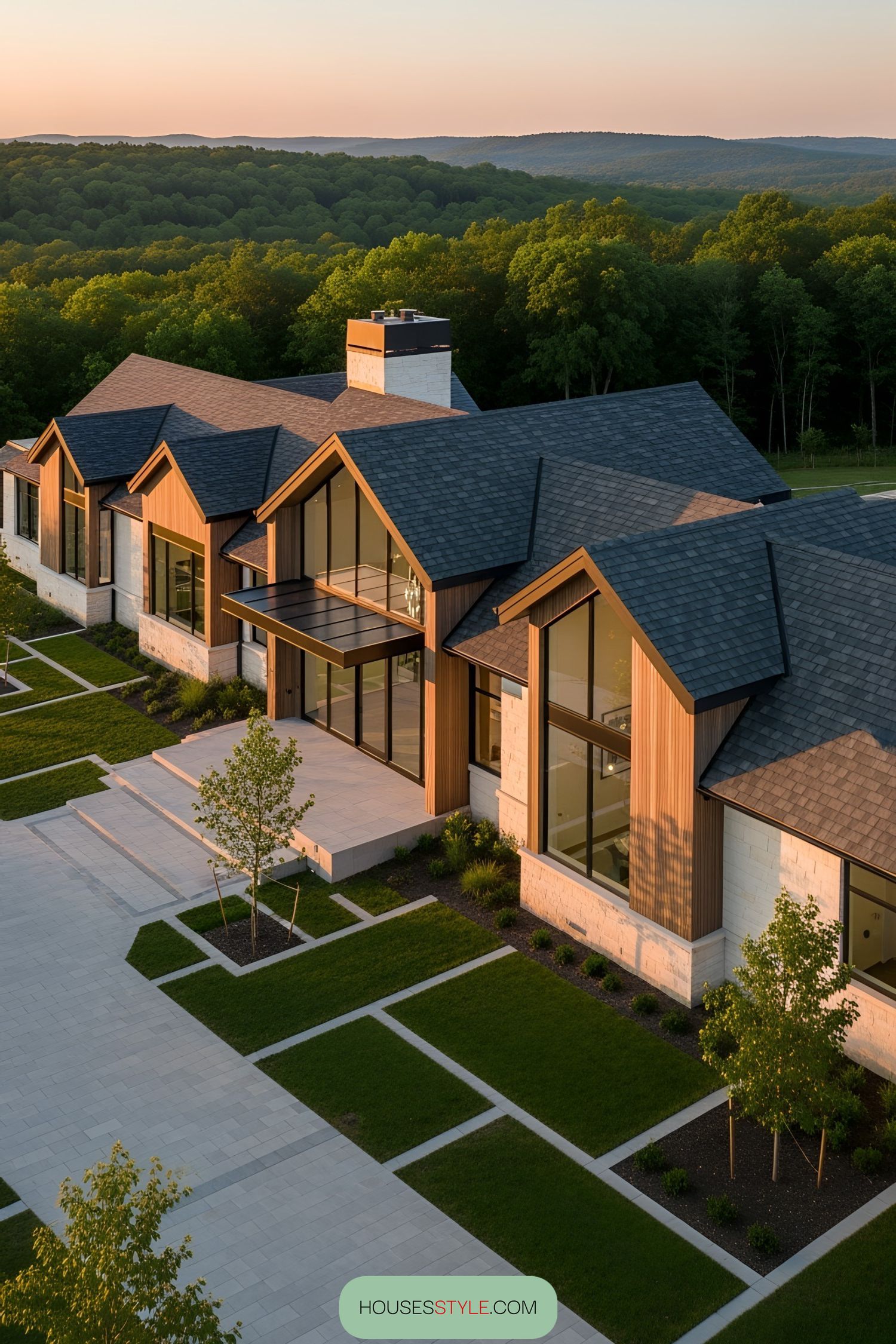 Luxury modern house with large windows and lush surroundings