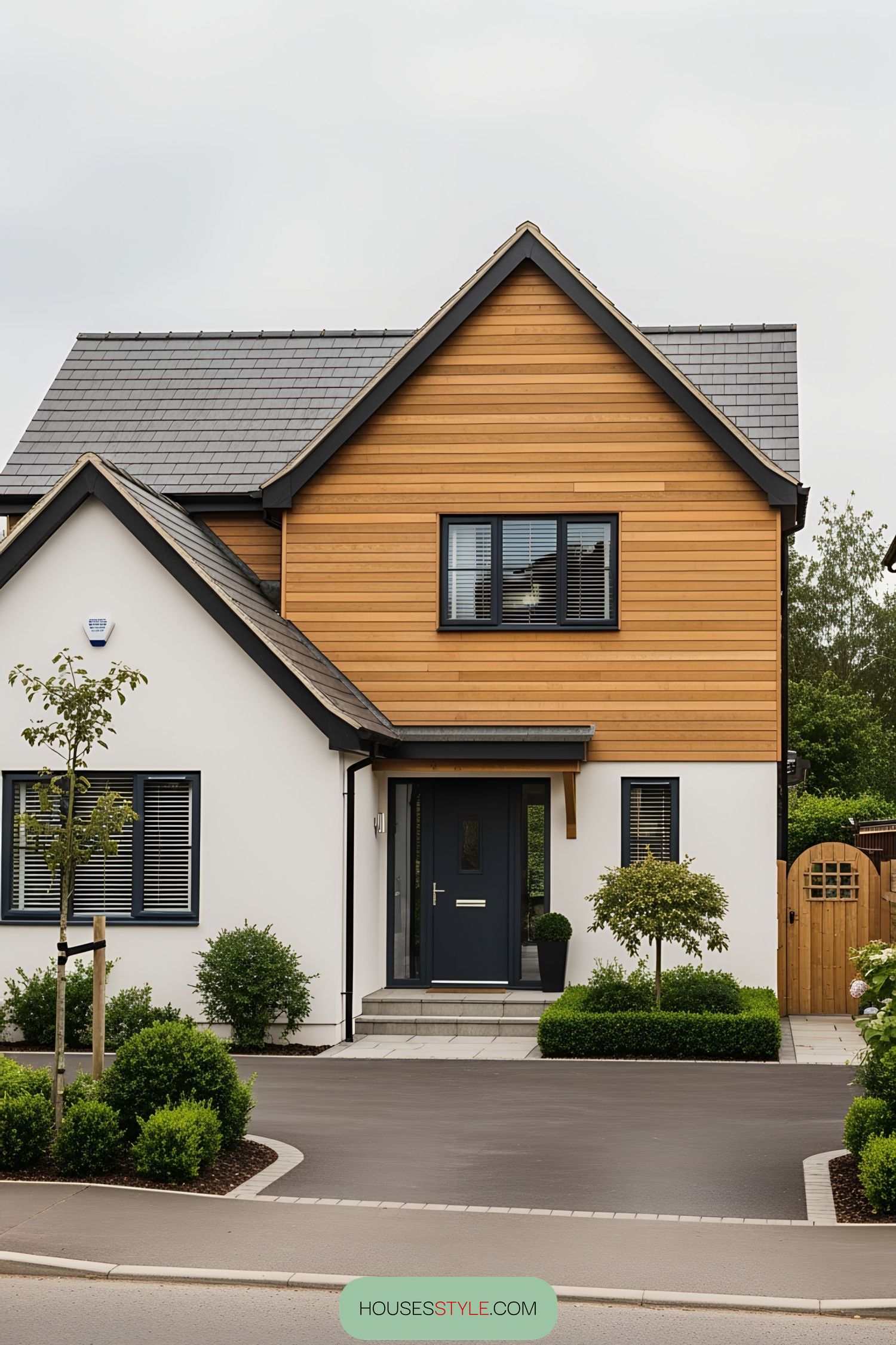 Two-tone bungalow with wood and white exterior