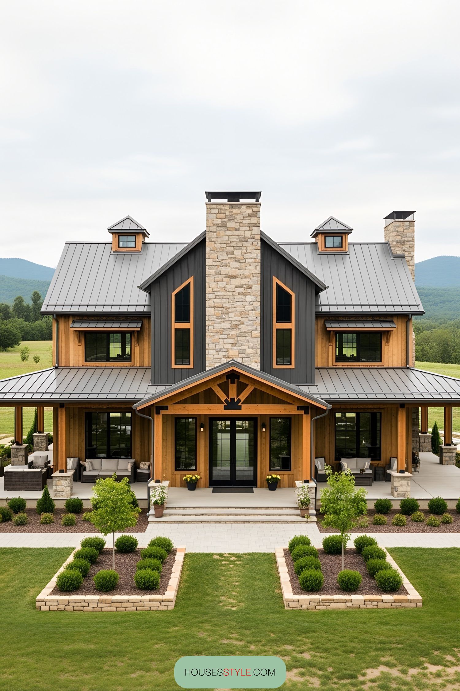 Large barn-style home with wraparound porch