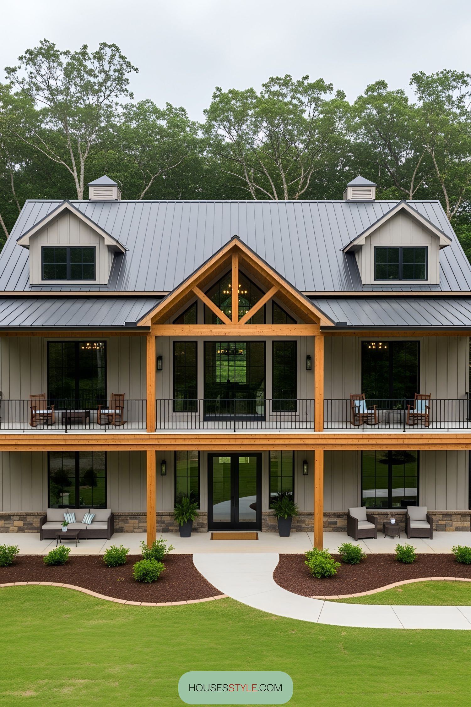 Elegant barn-style home with wraparound porch