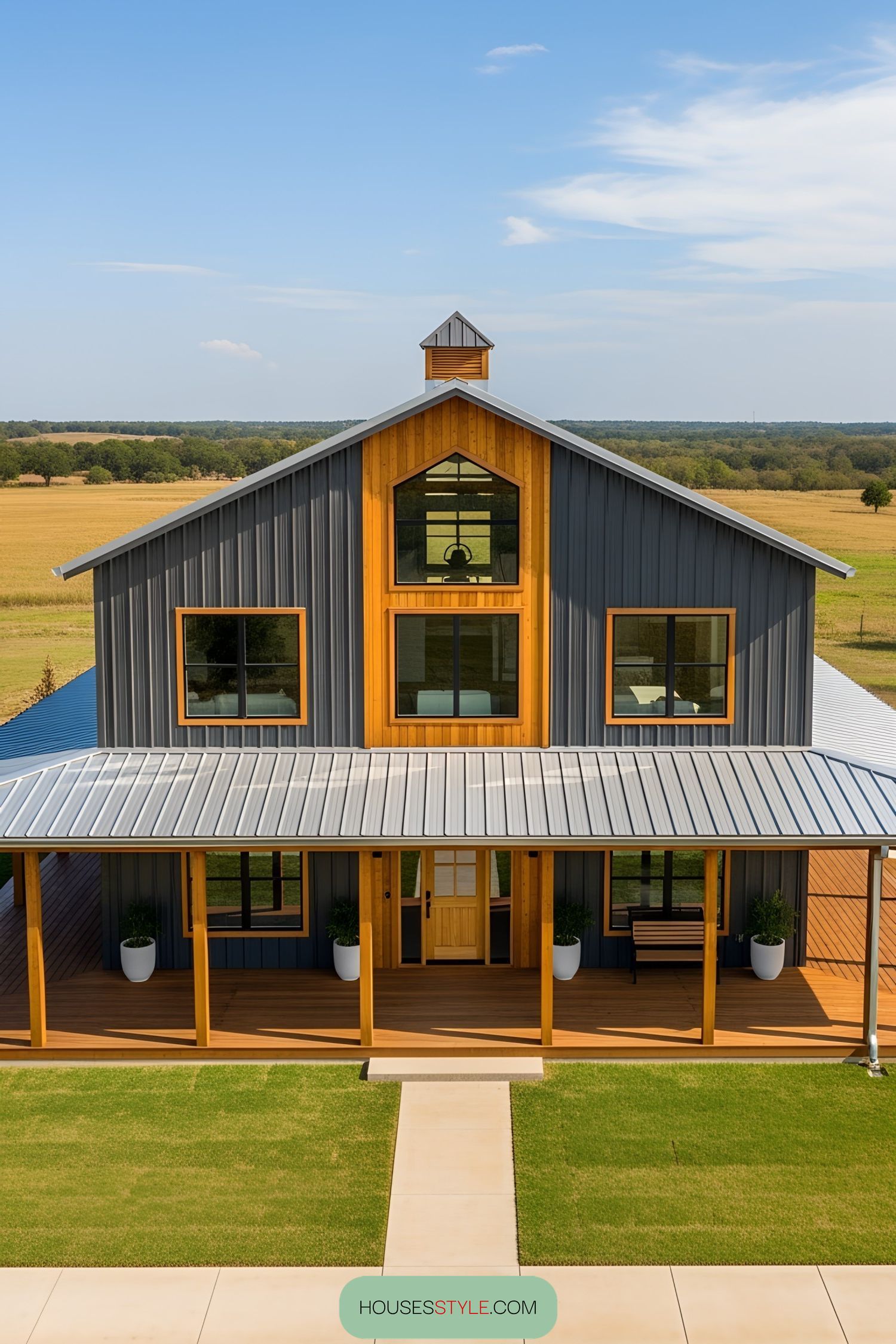 Spacious barn-style home with extensive wraparound porch