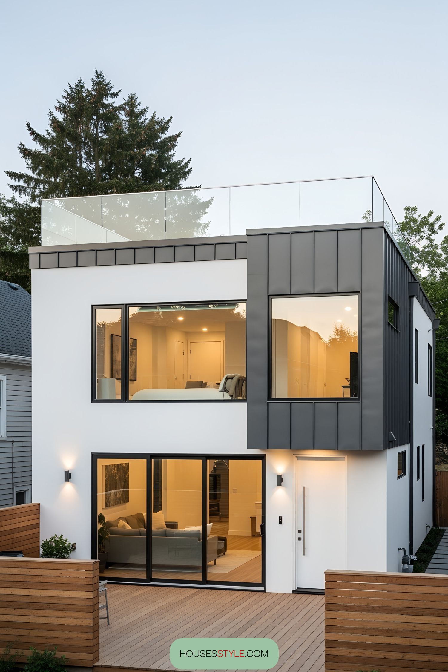 Modern bungalow with rooftop deck and glass railings