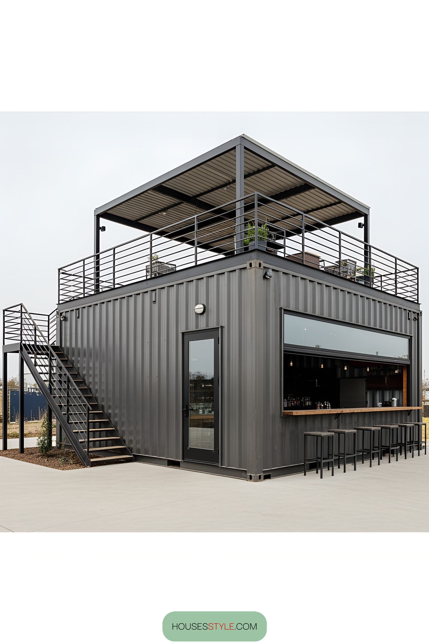 Shipping container bar with rooftop seating