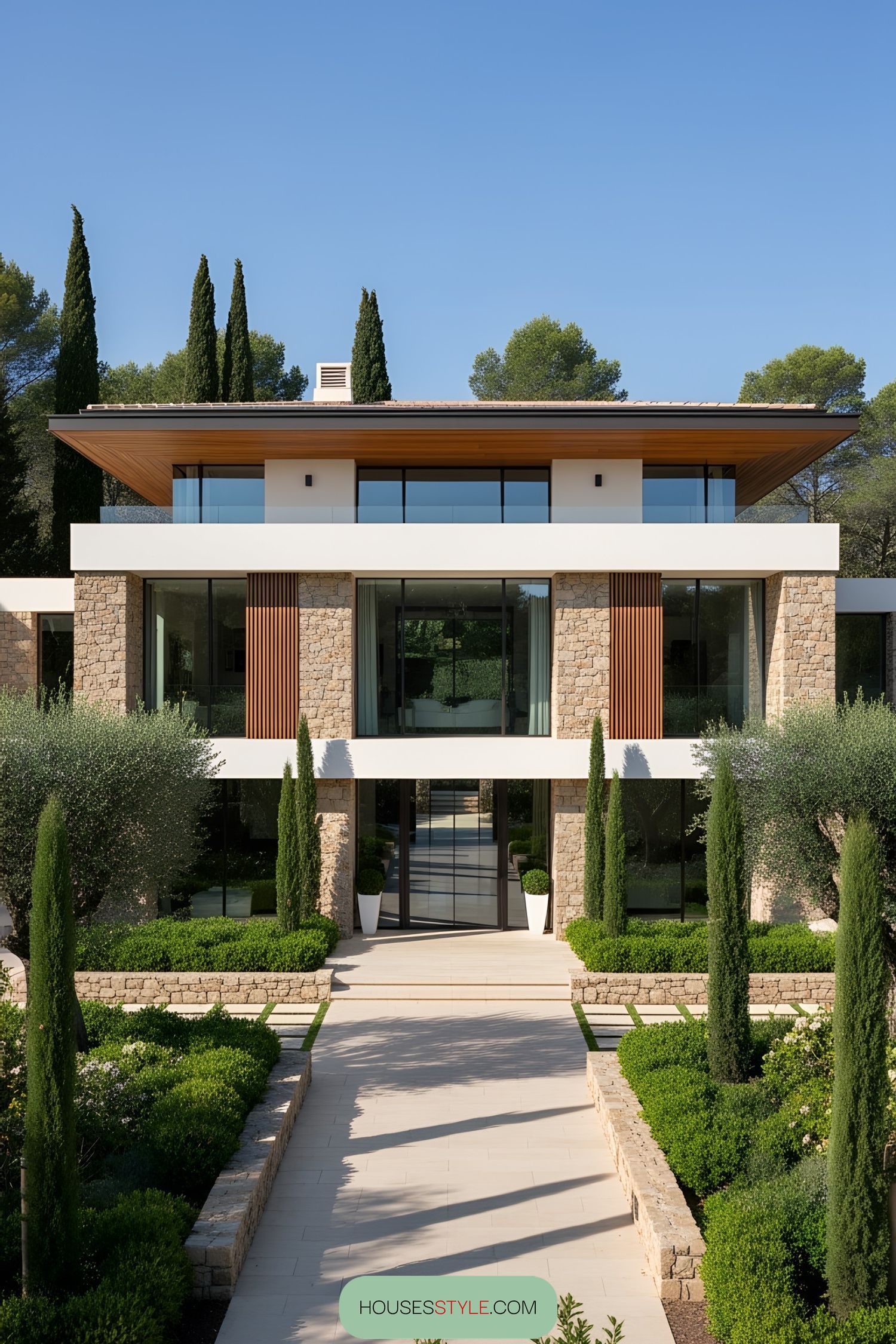 Luxury villa with stone facade and manicured garden