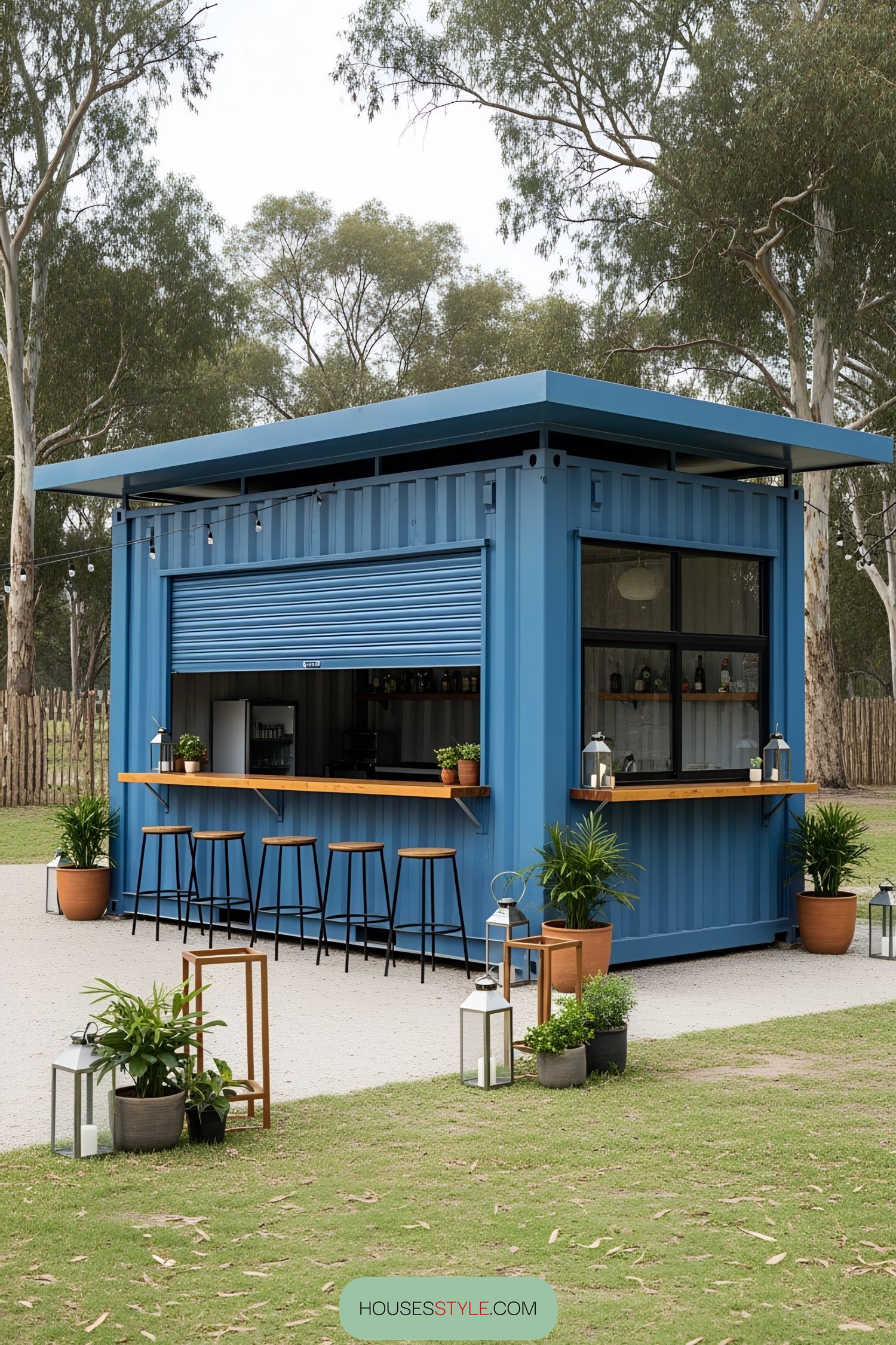 Blue shipping container bar with stools