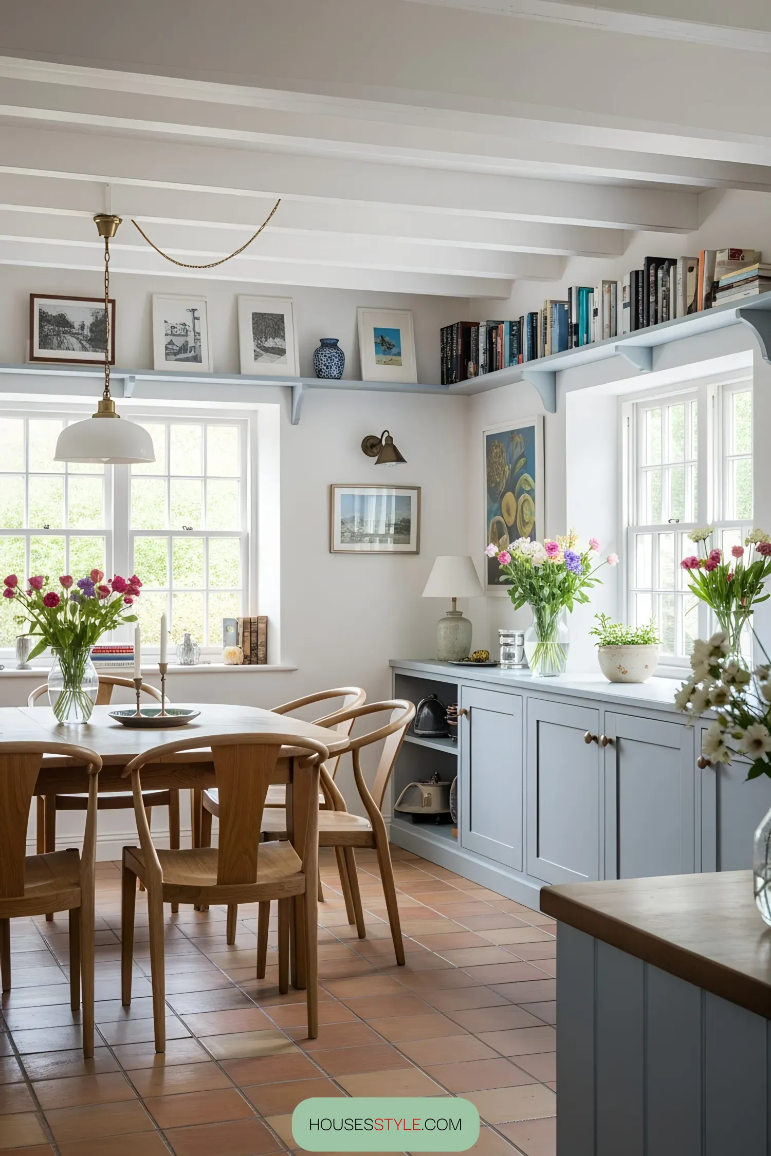 Cozy kitchen corner with wooden chairs and floral accents