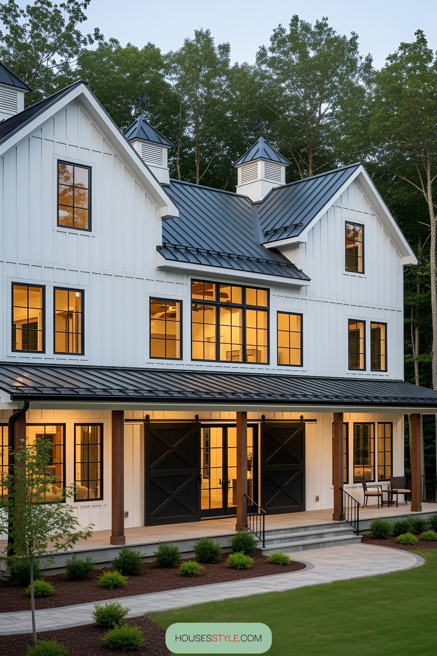 Charming white barn house with black accents