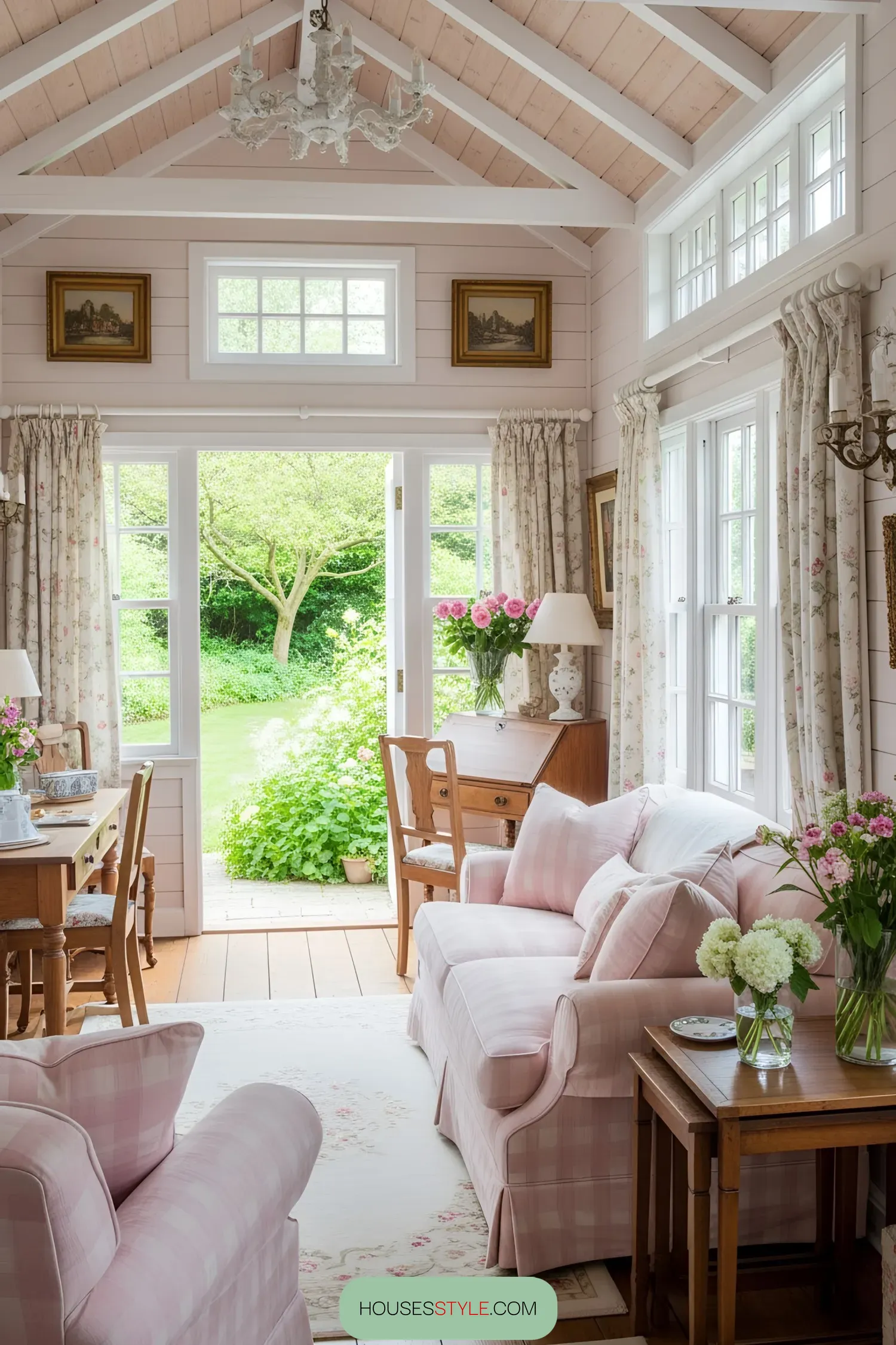 Charming cottage interior with pink checkered furniture and floral curtains