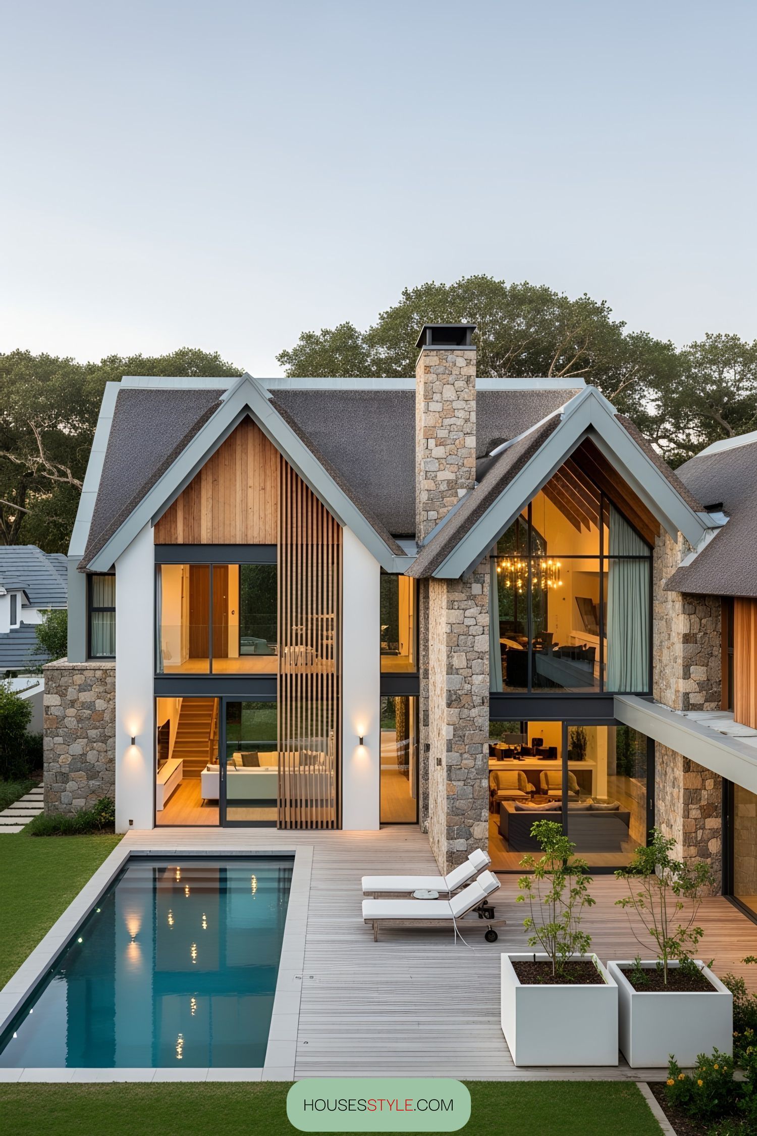 Modern villa with stone accents and a pool