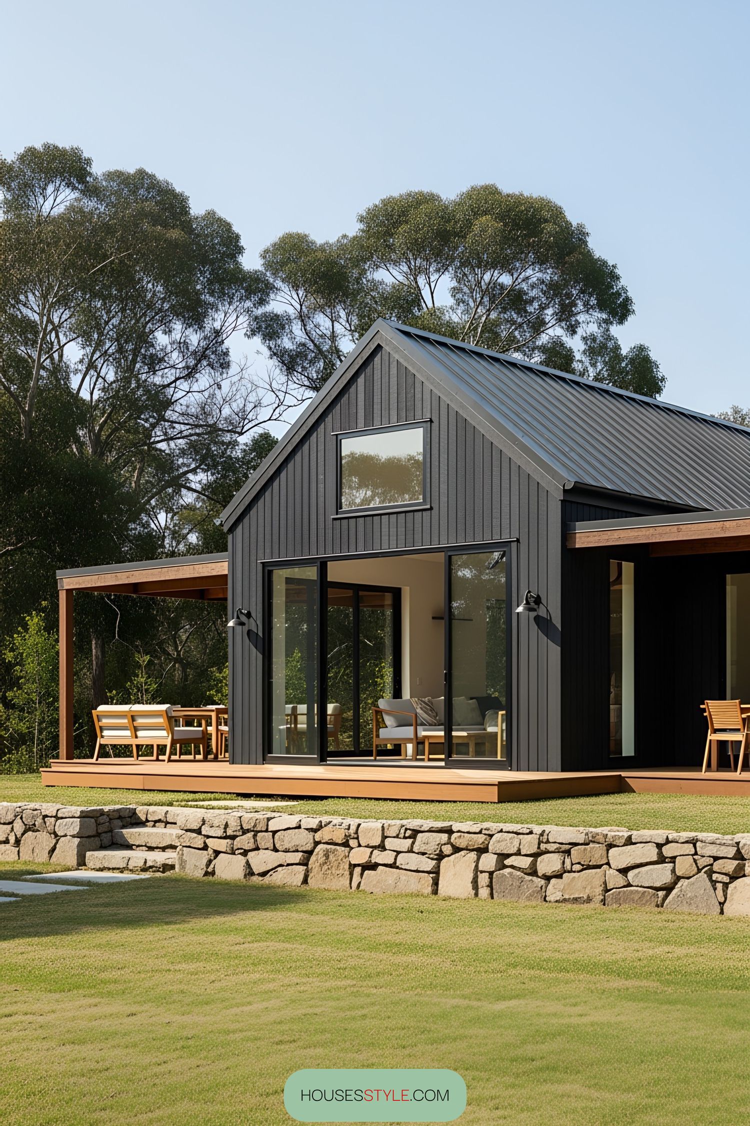 Black barn house with sleek wooden accents