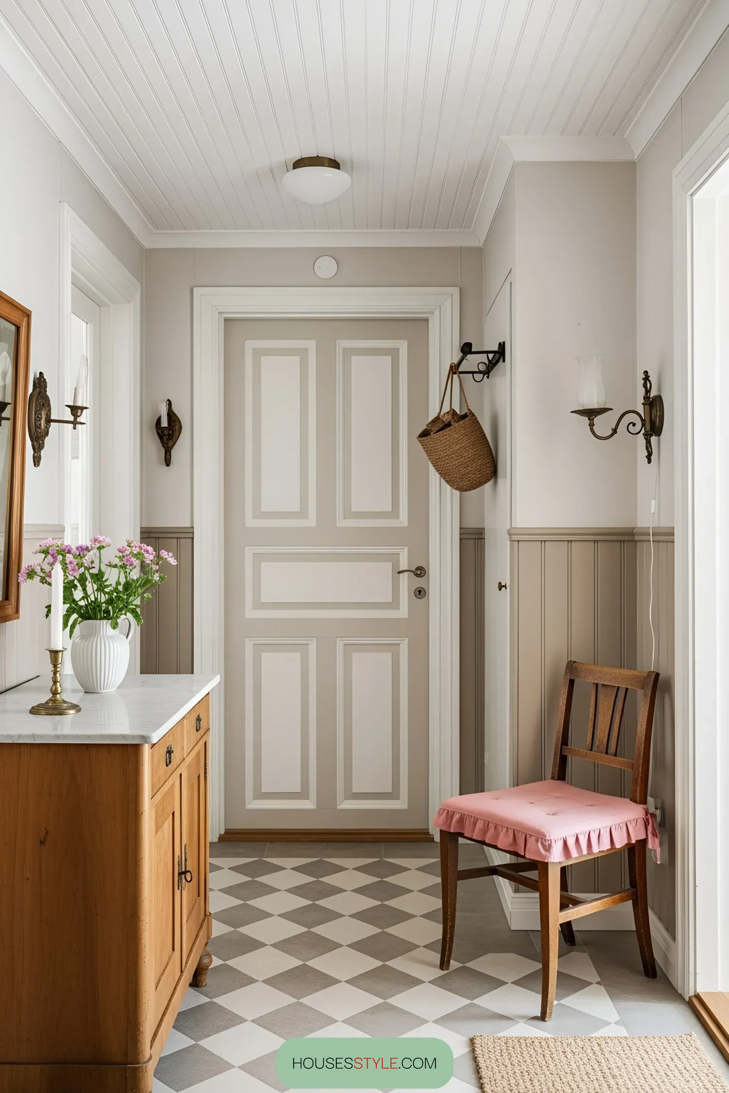 Elegant Swedish entryway with vintage accents