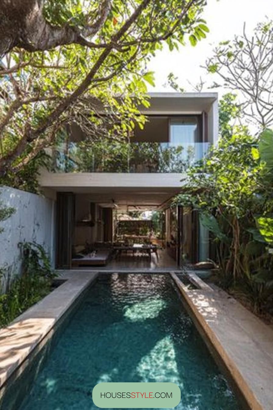 modern house with a compact pool along the wall tree lined garden 3